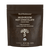 Front of a brown bag labeled "Real Mushrooms Mushroom Hot Chocolate Mix" featuring 5 mushroom types, heirloom cacao, organic extract, vegan, and organic certification. Net weight: 240g (8.47 oz), 15 servings.