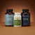 The Real Mushrooms Cognitive, Stress & Longevity Support Bundle is displayed against a brown gradient background, highlighting premium mushroom extracts designed to aid relaxation and cognitive performance.
