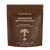 A brown pouch labeled "Mushroom Hot Chocolate Mix" by Real Mushrooms, featuring vegan, organic cacao powder, a functional mushroom extract blend, and USDA organic certification.