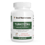 A white bottle labeled “Real Mushrooms Turkey Tail Mushroom Capsules,” containing 90 capsules made with mushroom extract powder rich in beta-glucans, designed to help support a healthy immune system.