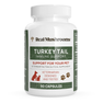 A white bottle labeled "Real Mushrooms Turkey Tail Extract Capsules for Pets," containing 90 capsules of organic turkey tail mushrooms, veterinarian-designed and tested, with dog and cat icons on the label.