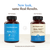 Two bottles of Real Mushrooms RealRest (Reishi, Valerian, and Lemon Balm) sit side by side, showing the update from old dark labels to new beige packaging that highlights calming ingredients like Lemon Balm and Reishi.