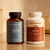 The Daily Calm Duo by Real Mushrooms, featuring Lion’s Mane CALM and Reishi Mushroom Extract Powder (90 capsules each), is displayed on a countertop to support emotional well-being.
